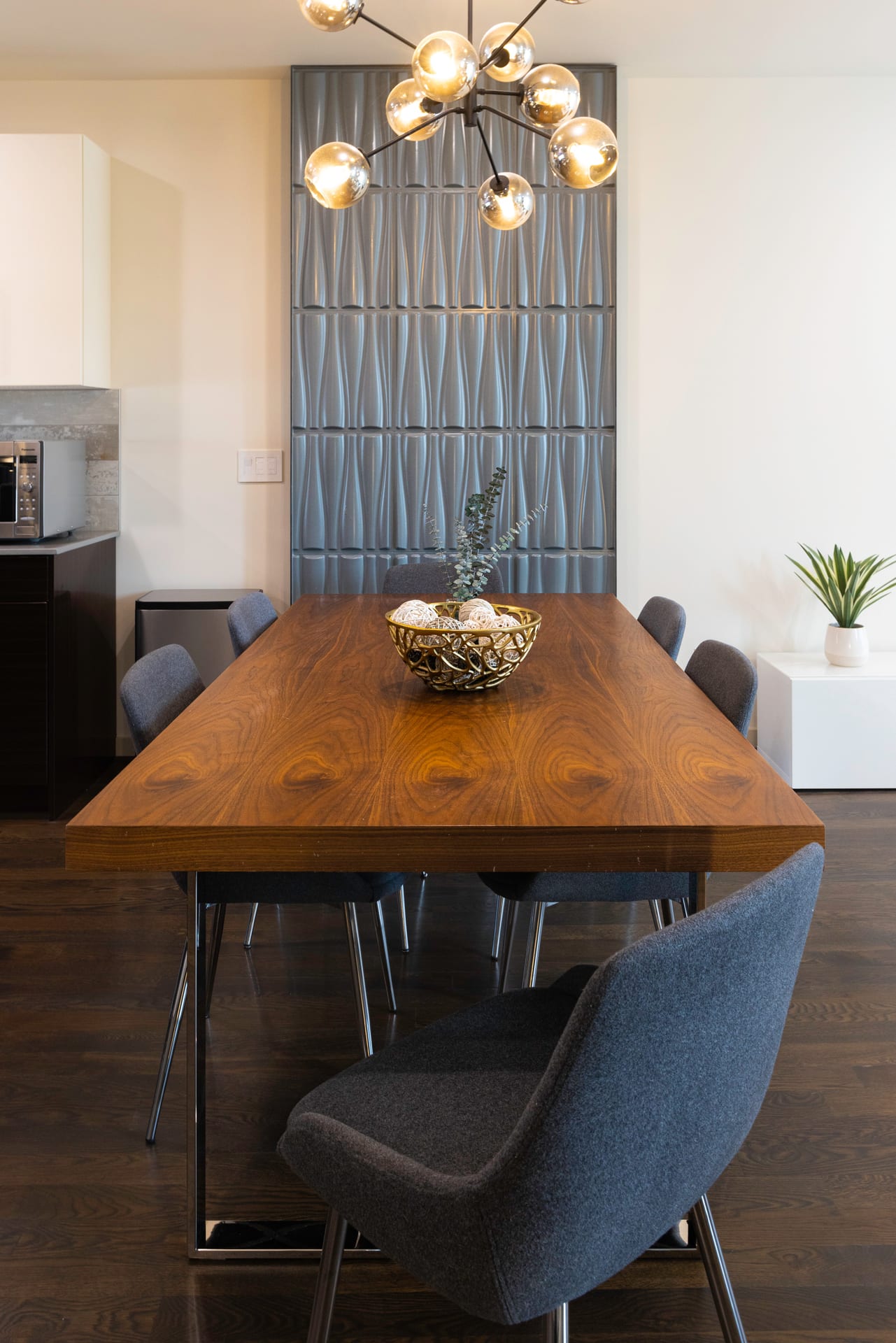 Dining area with pendant lighting and seating for six
